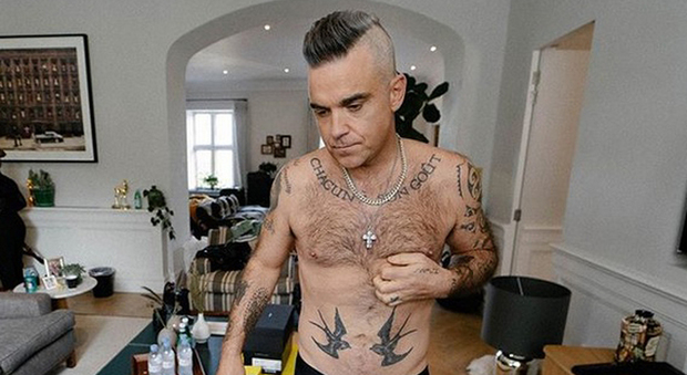 Robbie Williams: “Dei banditi hanno minacciato di tagliarmi la testa”