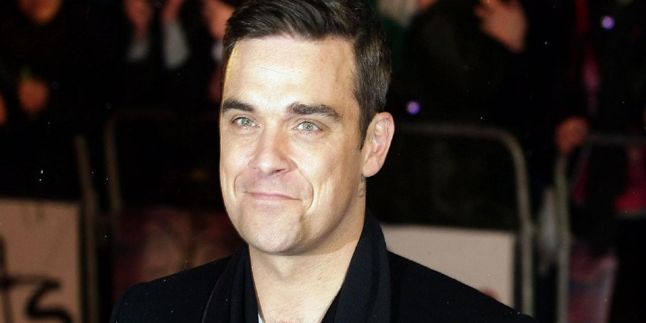 Robbie Williams, 25 anni dopo i Take That formerà una nuova band