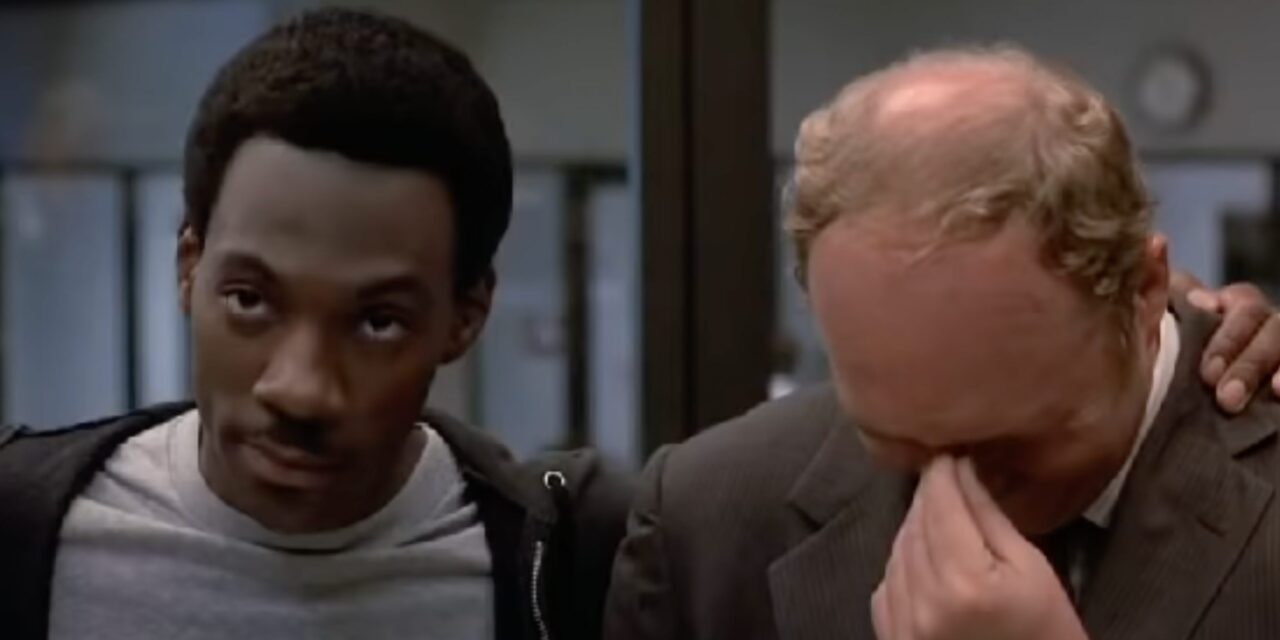 Beverly Hills Cop, Ashton: “Eddie improvvisò il monologo dei super poliziotti, per me fu difficile rimanere serio”